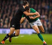 17 November 2018; Jacob Stockdale of Ireland is tackled by Ben Smith of New Zealand during the Guinness Series International match between Ireland and New Zealand at Aviva Stadium, Dublin. Photo by Brendan Moran/Sportsfile