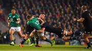 17 November 2018; Garry Ringrose of Ireland is tackled by Ryan Crotty and Kieran Read of New Zealand during the Guinness Series International match between Ireland and New Zealand at Aviva Stadium, Dublin. Photo by Brendan Moran/Sportsfile