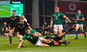 17 November 2018; Jacob Stockdale of Ireland is tackled by Aaron Smith of New Zealand on his way to scoring his side's first try during the Guinness Series International match between Ireland and New Zealand at the Aviva Stadium in Dublin. Photo by Ramsey Cardy/Sportsfile