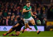 17 November 2018; Jacob Stockdale of Ireland in action against Anton Lienert-Brown of New Zealand during the Guinness Series International match between Ireland and New Zealand at the Aviva Stadium in Dublin. Photo by Ramsey Cardy/Sportsfile