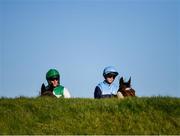 18 November 2018; Jockeys Mikey O'Connor, left, on Black Benny, and Rachael Blackmore, on Full Cry, inspect Ruby's Double prior to the EMS Copiers Risk Of Thunder Steeplechase at Punchestown Racecourse in Naas, Co. Kildare. Photo by Seb Daly/Sportsfile