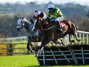 18 November 2018; Hearts Are Trumps, right, with Mark Walsh up, jumps the last, alongside eventual second place Makitorix, with Ruby Walsh up, on their way to winning the Irish Daily Mirror Handicap Hurdle at Punchestown Racecourse in Naas, Co. Kildare. Photo by Seb Daly/Sportsfile