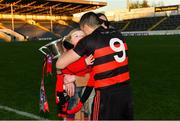 18 November 2018; Ballygunner joint captain Shane O'Sullivan celebrates with his 2-year-old son Ferdia and his partner Ciara after the AIB Munster GAA Hurling Senior Club Championship Final between Na Piarsaigh and Ballygunner at Semple Stadium in Thurles, Co. Tipperary. Photo by Diarmuid Greene/Sportsfile