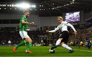18 November 2018; Xaver Schlager of Austria in action against Gareth McAuley of Northern Ireland during the UEFA Nations League match between Northern Ireland and Austria at the National Football Stadium in Windsor Park, Belfast. Photo by David Fitzgerald/Sportsfile