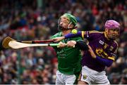 18 November 2018; Cian Lynch of Limerick in action against Shaun Murphy of Wexford during the Aer Lingus Fenway Hurling Classic 2018 semi-final match between Limerick and Wexford at Fenway Park in Boston, MA, USA. Photo by Piaras Ó Mídheach/Sportsfile