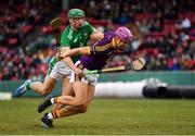 18 November 2018; Jack O'Connor of Wexford in action against Seán Finn of Limerick during the Aer Lingus Fenway Hurling Classic 2018 semi-final match between Limerick and Wexford at Fenway Park in Boston, MA, USA. Photo by Piaras Ó Mídheach/Sportsfile