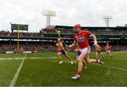 18 November 2018; Damien Cahalane of Cork gets away from Shane Golden, behind, and Aron Shanagher of Clare  during the Aer Lingus Fenway Hurling Classic 2018 semi-final match between Clare and Cork at Fenway Park in Boston, MA, USA. Photo by Piaras Ó Mídheach/Sportsfile