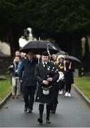 21 November 2018; Piper Pat Nolan leads the procession to the unveiling of a memorial headstone to Bloody Sunday victim John William Scott who was shot and killed aged 14 at Croke Park at Glasnevin Cemetery in Dublin. Photo by David Fitzgerald/Sportsfile