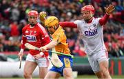 18 November 2018; Podge Collins of Clare is tackled by Anthony Nash of Cork as Colm Spillane of Cork, left, looks on during the Aer Lingus Fenway Hurling Classic 2018 semi-final match between Clare and Cork at Fenway Park in Boston, MA, USA. Photo by Piaras Ó Mídheach/Sportsfile