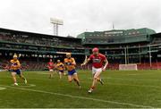 18 November 2018; Damien Cahalane of Cork gets away from Shane Golden, centre, and Aron Shanagher of Clare  during the Aer Lingus Fenway Hurling Classic 2018 semi-final match between Clare and Cork at Fenway Park in Boston, MA, USA. Photo by Piaras Ó Mídheach/Sportsfile