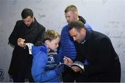 23 November 2018; Dave Kearney, right, Seán O'Brien and Robbie Henshaw of Leinster sign autographs for Sam Casey, age eight, from Blackrock, Co Dublin, in Autograph Alley at the Guinness PRO14 Round 9 match between Leinster and Ospreys at the RDS Arena in Dublin. Photo by Harry Murphy/Sportsfile