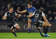 23 November 2018; Conor O'Brien of Leinster is tackled by Johnny Kotze, left, and Cory Allen of Ospreys during the Guinness PRO14 Round 9 match between Leinster and Ospreys at the RDS Arena in Dublin. Photo by Seb Daly/Sportsfile