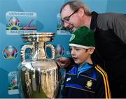 24 November 2018; Pierce McHugh, age 9, from Mountmerrion, with father Johnny McHugh, with the Henri Delaunay Trophy at the National Football Exhibition at Dundrum Shopping Centre in Dundrum, Dublin. Photo by Seb Daly/Sportsfile