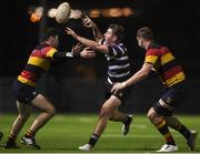23 November 2018; Jamie Glynn of Terenure College gets his pass away as he is tackled by Jack O'Sullivan, right, and Tim Murphy of Lansdowne during the Ulster Bank League Division 1A match between Lansdowne and Terenure College at Aviva Stadium in Dublin.  Photo by Ben McShane/Sportsfile