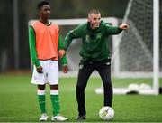 24 November 2018; Republic of Ireland U18 Manager, Jim Crawford, right, and UCD U16's player Bobo Adejumobi during the 2018 FAI Coach Education Conference at IT Carlow, in Carlow. Photo by Harry Murphy/Sportsfile