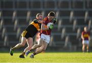 25 November 2018; Eoin Cleary of St Joseph’s Miltown Malbay is tackled by Shane Doolan of Dr Crokes during the AIB Munster GAA Football Senior Club Championship Final match between Dr. Crokes and St. Josephs Miltown Malbay at the Gaelic Grounds in Limerick. Photo by Eóin Noonan/Sportsfile