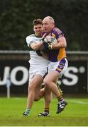 25 November 2018; Pat Burke of Kilmacud Crokes in action against David Seale of Portlaoise during the AIB Leinster GAA Football Senior Club Championship semi-final match between Kilmacud Crokes and Portlaoise at Parnell Park in Dublin. Photo by Daire Brennan/Sportsfile