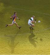 25 November 2018; Brian McCormack of Portlaoise in action against Aidan Jones of Kilmacud Crokes during the AIB Leinster GAA Football Senior Club Championship semi-final match between Kilmacud Crokes and Portlaoise at Parnell Park in Dublin. Photo by Daire Brennan/Sportsfile