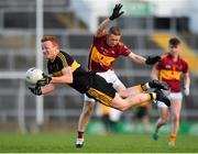 25 November 2018; Johnny Buckley of Dr Crokes is tackled by Eoin Curtin of St Joseph’s Miltown Malbay during the AIB Munster GAA Football Senior Club Championship Final match between Dr. Crokes and St. Josephs Miltown Malbay at the Gaelic Grounds in Limerick. Photo by Eóin Noonan/Sportsfile