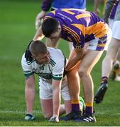 25 November 2018; A dejected Scott Lawless of Portlaoise is consoled by Aidan Jones of Kilmacud Crokes after the AIB Leinster GAA Football Senior Club Championship semi-final match between Kilmacud Crokes and Portlaoise at Parnell Park in Dublin. Photo by Daire Brennan/Sportsfile