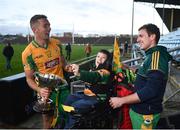 25 November 2018; Corofin supporter Tomas McLoughlin, age 8, from Corofin, with Mike Farragher, left, and Dylan Wall following the AIB Connacht GAA Football Senior Club Championship Final match between Ballintubber and Corofin at Elvery's MacHale Park in Castlebar, Mayo. Photo by David Fitzgerald/Sportsfile