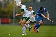 3 November 2018; Aron Shanagher of Ireland in action against Lachlan Smith of Scotland during the U21 Hurling Shinty International 2018 match between Ireland and Scotland at Games Development Centre in Abbotstown, Dublin. Photo by Piaras Ó Mídheach/Sportsfile