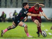 25 November 2018; Neil Cronin of Munster kicks the ball as he is tackled by Renato Giammarioli of Zebre during the Guinness PRO14 Round 9 match between Zebre and Munster at Stadio Sergio Lanfranchi in Parma, Italy. Photo by Roberto Bregani/Sportsfile