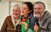25 November 2018; World Champion Kellie Harrington with her parents Yvonne and Christy and her gold medal on Team Ireland's return from AIBA Women's World Boxing Championship at Dublin Airport, Dublin. Photo by Brendan Moran/Sportsfile