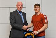 26 November 2018; Brian Mullins, Director of Sport, UCD, presents footballer Con O'Callaghan of Cuala and Dublin with a UCD scarf during the UCD GAA Sports Scholarship Presentation 2018/2019 at UCD in Dublin. Photo by Piaras Ó Mídheach/Sportsfile