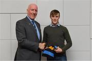 26 November 2018; Brian Mullins, Director of Sport, UCD, presents hurler Niall Heffernan of Golden/Kilfeakle and Tipperary with a UCD scarf during the UCD GAA Sports Scholarship Presentation 2018/2019 at UCD in Dublin. Photo by Piaras Ó Mídheach/Sportsfile