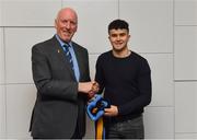 26 November 2018; Brian Mullins, Director of Sport, UCD, presents hurler Podge Guinan of Drumcullen and Offaly with a UCD scarf during the UCD GAA Sports Scholarship Presentation 2018/2019 at UCD in Dublin. Photo by Piaras Ó Mídheach/Sportsfile