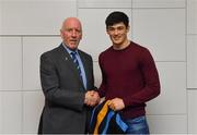 26 November 2018; Brian Mullins, Director of Sport, UCD, presents hurler Barry O'Connor of St Martin's and Wexford with a UCD scarf during the UCD GAA Sports Scholarship Presentation 2018/2019 at UCD in Dublin. Photo by Piaras Ó Mídheach/Sportsfile