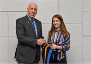 26 November 2018; Brian Mullins, Director of Sport, UCD, presents ladies football player Kate McGrath of Kilrossanty Brickeys and Waterford with a UCD scarf during the UCD GAA Sports Scholarship Presentation 2018/2019 at UCD in Dublin. Photo by Piaras Ó Mídheach/Sportsfile