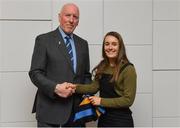 26 November 2018; Brian Mullins, Director of Sport, UCD, presents ladies football player Lucy McCartan of St. Loman’s, Mullingar, and Westmeath with a UCD scarf during the UCD GAA Sports Scholarship Presentation 2018/2019 at UCD in Dublin. Photo by Piaras Ó Mídheach/Sportsfile