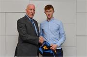 26 November 2018; Brian Mullins, Director of Sport, UCD, presents hurler Cian Minogue of Bodyke and Clare with a UCD scarf during the UCD GAA Sports Scholarship Presentation 2018/2019 at UCD in Dublin. Photo by Piaras Ó Mídheach/Sportsfile