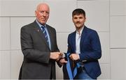 26 November 2018; Brian Mullins, Director of Sport, UCD, presents footballer Conor Hartley of Sarsfields and Kildare with a UCD scarf during the UCD GAA Sports Scholarship Presentation 2018/2019 at UCD in Dublin. Photo by Piaras Ó Mídheach/Sportsfile