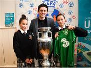 28 November 2018; Former Republic of Ireland midfielder Keith Andrews, Jessica Ziu of Republic of Ireland and Shelbourne, and Lord Mayor of Dublin Nial Ring brought the the iconic Henri Delaunay trophy to visit CBS Westland Row, to mark Dublin’s hosting of the UEFA EURO 2020 Qualifying Group Draw at the Convention Centre on Sunday, December 2nd. To celebrate the Qualifying Draw, Dublin City Council and the FAI will hold three ‘Street Legends’ community football events at Aughrim St Community Hall (Wednesday, November 28th), Mountjoy Square South (Thursday, November 29th) and Commons Street (Saturday, December 1st). The hosting of the Qualifying Draw will also coincide with the launch of the National Football Exhibition at the Printworks, Dublin Castle, which will open to the public on Sunday, December 2nd 2018. The Exhibition will be home to a number of elements with historical significance to Irish football. Four tournament games will be hosted at Dublin’s Aviva Stadium during UEFA EURO 2020, the largest sporting event to ever be hosted in the country. Pictured with the Henri Delaunay trophy at CBS Westland Row is former Republic of Ireland midfielder Keith Andrews with students Manare, left, and Eamane Bourradou. Photo by Stephen McCarthy/Sportsfile