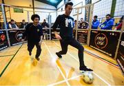 28 November 2018; Former Republic of Ireland defender Stephen Kelly takes on Ryan Scully of St. Paul’s CBS Primary, North Brunswick Street, at the first ‘Street Legends’ community football event in Aughrim Street Community Hall, Dublin. Also in attendance were Lord Mayor of Dublin Nial Ring, Minister of State Brendan Griffin and FAI Chief Executive John Delaney, ex-Republic of Ireland footballer Stephen Kelly and Republic of Ireland women’s national team footballer Isibeal Atkinson. To celebrate Dublin’s hosting of the UEFA EURO 2020 Qualifying Group Draw, Dublin City Council and the FAI will hold two further ‘Street Legends’ community football events at Mountjoy Square South (Thursday, November 29th) and Commons Street (Saturday, December 1st). The hosting of the Qualifying Draw will also coincide with the launch of the National Football Exhibition at the Printworks, Dublin Castle, which will open to the public on Sunday, December 2nd 2018. The Exhibition will be home to a number of elements with historical significance to Irish football. Four tournament games will be hosted at Dublin’s Aviva Stadium during UEFA EURO 2020, the largest sporting event to ever be hosted in the country. Photo by Stephen McCarthy/Sportsfile