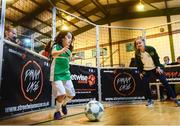 28 November 2018; Republic of Ireland international Isibeal Atkinson takes on Emma Mushtaq, age 7, from Sandyford, at the first ‘Street Legends’ community football event in Aughrim Street Community Hall, Dublin. Also in attendance were Lord Mayor of Dublin Nial Ring, Minister of State Brendan Griffin and FAI Chief Executive John Delaney, ex-Republic of Ireland footballer Stephen Kelly and Republic of Ireland women’s national team footballer Isibeal Atkinson. To celebrate Dublin’s hosting of the UEFA EURO 2020 Qualifying Group Draw, Dublin City Council and the FAI will hold two further ‘Street Legends’ community football events at Mountjoy Square South (Thursday, November 29th) and Commons Street (Saturday, December 1st). The hosting of the Qualifying Draw will also coincide with the launch of the National Football Exhibition at the Printworks, Dublin Castle, which will open to the public on Sunday, December 2nd 2018. The Exhibition will be home to a number of elements with historical significance to Irish football. Four tournament games will be hosted at Dublin’s Aviva Stadium during UEFA EURO 2020, the largest sporting event to ever be hosted in the country. Photo by Stephen McCarthy/Sportsfile