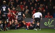 30 November 2018; Chris Farrell of Munster scores his side's first try despite the efforts of Dougie Fife of Edinburgh during the Guinness PRO14 Round 10 match between Munster and Edinburgh at Irish Independent Park in Cork. Photo by Diarmuid Greene/Sportsfile