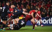 30 November 2018; Niall Scannell of Munster is tackled by David Cherry and Luke Hamilton of Edinburgh during the Guinness PRO14 Round 10 match between Munster and Edinburgh at Irish Independent Park in Cork. Photo by Diarmuid Greene/Sportsfile