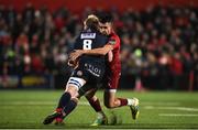 30 November 2018; Luke Hamilton of Edinburgh is tackled by Conor Murray of Munster during the Guinness PRO14 Round 10 match between Munster and Edinburgh at Irish Independent Park in Cork. Photo by Diarmuid Greene/Sportsfile