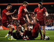 30 November Keith Earls of Munster is congratulated by team-mates Conor Murray, Mike Haley, and Andrew Conway after scoring his second try of the game during the Guinness PRO14 Round 10 match between Munster and Edinburgh at Irish Independent Park in Cork. Photo by Diarmuid Greene/Sportsfile