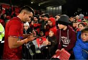 30 November 2018; Conor Murray of Munster signs autographs for supporters after the Guinness PRO14 Round 10 match between Munster and Edinburgh at Irish Independent Park in Cork. Photo by Diarmuid Greene/Sportsfile