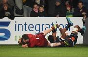 30 November 2018; Chris Farrell of Munster scores his side's last try of the game despite the efforts of Senitiki Nayalo of Edinburgh during the Guinness PRO14 Round 10 match between Munster and Edinburgh at Irish Independent Park in Cork. Photo by Diarmuid Greene/Sportsfile