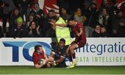 30 November 2018; Chris Farrell of Munster is congratulated by team-mate Conor Murray after scoring his side's last try of the game despite the efforts of Senitiki Nayalo of Edinburgh during the Guinness PRO14 Round 10 match between Munster and Edinbugh at Irish Independent Park in Cork. Photo by Diarmuid Greene/Sportsfile