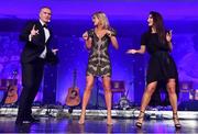 1 December 2018; MC Daithí O Sé with Dancing With The Stars' Emily Barker, left, and Ksenia Zsikhotska during the TG4 Ladies Football All Stars Awards 2018, in association with Lidl, at the Citywest Hotel in Dublin. Photo by Brendan Moran/Sportsfile