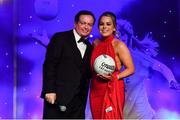 1 December 2018; Courtney Manning from Coolock, Dublin, is presented with a ball by MC Marty Morrissey during the TG4 Ladies Football All Stars Awards 2018, in association with Lidl, at the Citywest Hotel in Dublin. Photo by Brendan Moran/Sportsfile