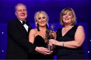 1 December 2018; Treasa Doherty of Donegal is presented with her TG4 All Star award by Ard Stiúrthóir TG4, Alan Esslemont and President of LGFA Marie Hickey during the TG4 Ladies Football All Stars Awards 2018, in association with Lidl, at the Citywest Hotel in Dublin. Photo by Brendan Moran/Sportsfile
