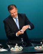 2 December 2018; Former Republic of Ireland international Ronnie Whelan draws a ball during the UEFA EURO2020 Qualifying Draw at the Convention Centre in Dublin. Photo by Sam Barnes/Sportsfile